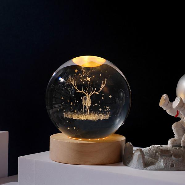 Glass globes with illuminated base. Multiple designs to suit different tastes.