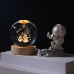 Glass globes with illuminated base. Multiple designs to suit different tastes.