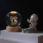 Glass globes with illuminated base. Multiple designs to suit different tastes.