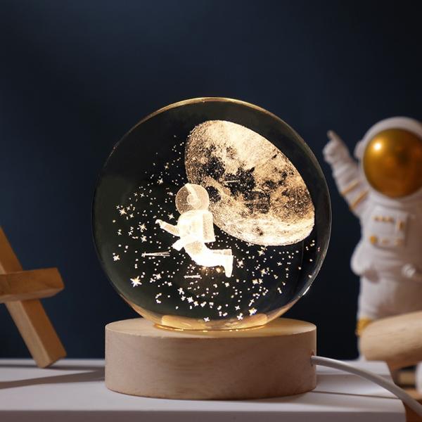 Glass globes with illuminated base. Multiple designs to suit different tastes.