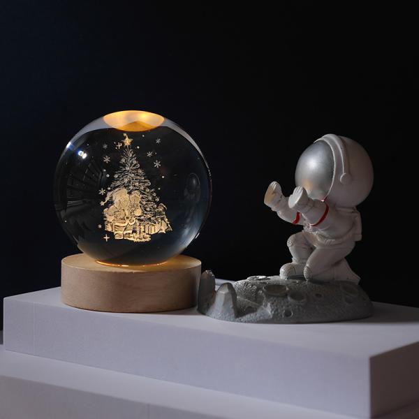 Glass globes with illuminated base. Multiple designs to suit different tastes.