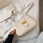 elegant handbag in four multi-colored colors. A luxurious touch to every look. Elevate your elegance with this classic bag, carefully designed to combine simplicity and elegance