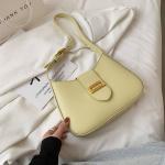 elegant handbag in four multi-colored colors. A luxurious touch to every look. Elevate your elegance with this classic bag, carefully designed to combine simplicity and elegance