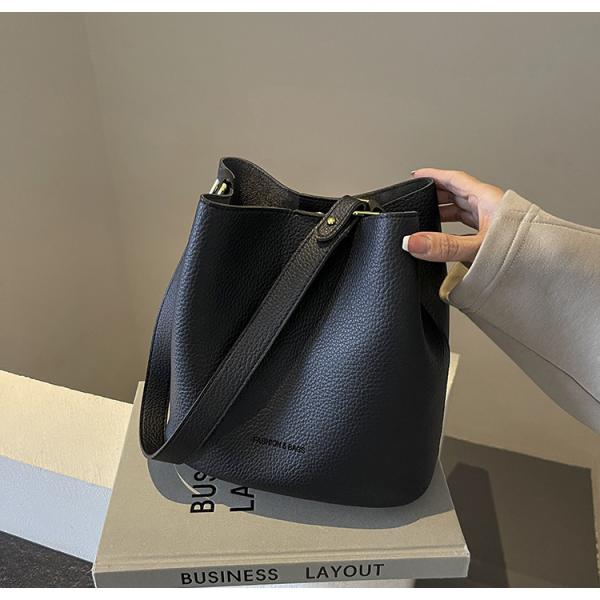 Bucket bags with a wallet are designed in a modern style that combines practicality and elegance. The bags feature a top drawstring design for easy closure.