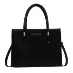 Elegant large capacity handbag in red and black, a perfect balance between practicality and attractiveness.
