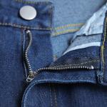 Dark navy skinny jeans highlight your figure and give you a modern look.